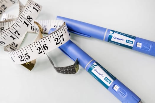 Ozempic Insulin injection pen for diabetics and weight loss. Concept of losing weight with the drug. High quality photo