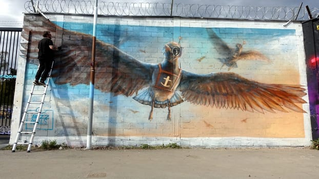 Stockholm, Snosatra, Sweden. May 12 2024. Spring beast. Graffiti exhibition on the outskirts of the city. Bird.