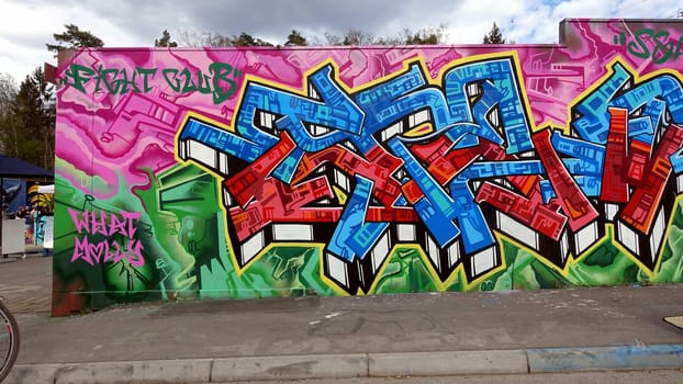 Stockholm, Snosatra, Sweden. May 12 2024. Spring beast. Graffiti exhibition on the outskirts of the city. Sidewalk.