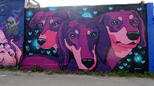 Stockholm, Snosatra, Sweden. May 12 2024. Spring beast. Graffiti exhibition on the outskirts of the city. Dogs.