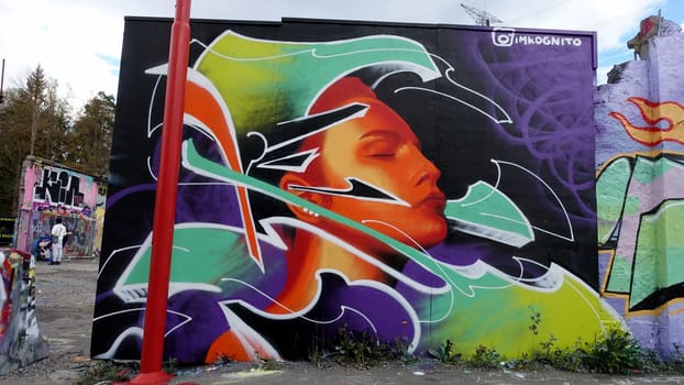 Stockholm, Snosatra, Sweden. May 12 2024. Spring beast. Graffiti exhibition on the outskirts of the city. Woman.