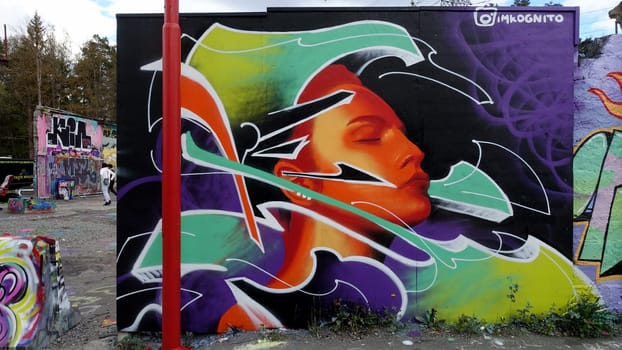 Stockholm, Snosatra, Sweden. May 12 2024. Spring beast. Graffiti exhibition on the outskirts of the city. Woman.