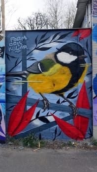 Stockholm, Snosatra, Sweden. May 12 2024. Spring beast. Graffiti exhibition on the outskirts of the city. Great tit.