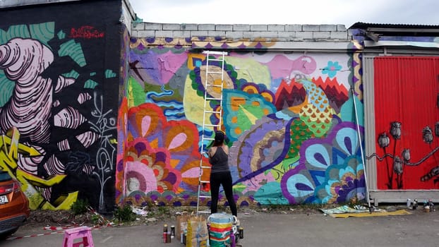 Stockholm, Snosatra, Sweden. May 12 2024. Spring beast. Graffiti exhibition on the outskirts of the city. Ladder.