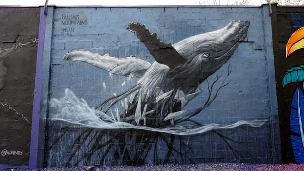 Stockholm, Snosatra, Sweden. May 12 2024. Spring beast. Graffiti exhibition on the outskirts of the city. Whale.
