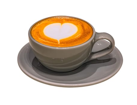 Isolated cup of cappuccino adorned with a lovely crafted heart-shaped latte art design against a white background served in a sleek gray ceramic cup and saucer creating an elegant contrast.
