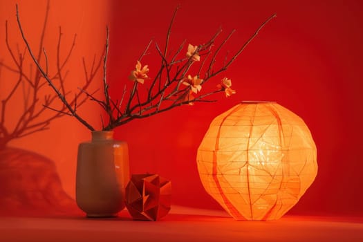 Floral decor and paper lanterns on table in elegant room for beauty and art exhibition