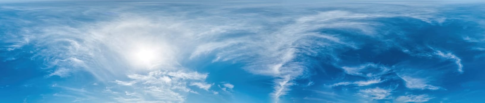 Blue sky with Cirrus clouds Seamless panorama in spherical equirectangular format. Complete zenith for use in 3D graphics, game and for composites in aerial drone 360 degree panoramas as a sky dome.