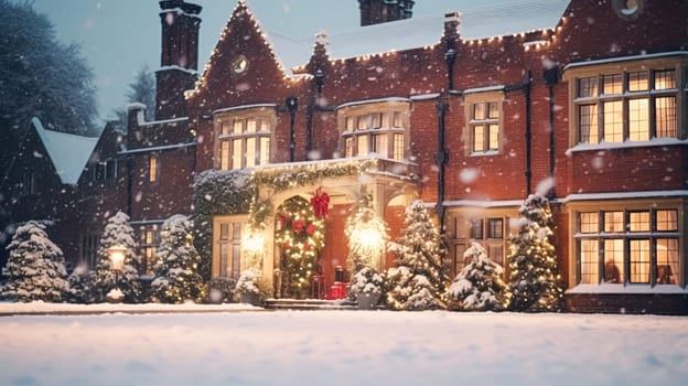 Christmas in the countryside manor, English country house mansion decorated for holidays on a snowy winter evening with snow and holiday lights, Merry Christmas and Happy Holidays design