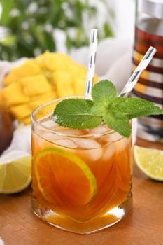 Mango iced tea with lime and mint has the perfect ratio of juice, tea and mint, sweetened with honey and so fresh and delicious. Prepare this summer refreshing organic soft drink.