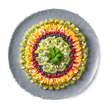 Fruit salad mandala a circular design of colorful fruit salad with juices splashing and mint. Food isolated on transparent background.