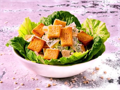 Caesar Salad Crisp romaine lettuce crunchy croutons and shaved Parmesan cheese tossed in creamy Caesar. Food isolated on transparent background.
