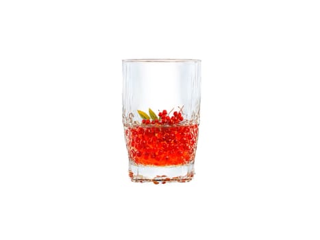 Rowanberry Juice Bitter rowanberry juice in a rustic glass rowanberries and autumn leaves splash in. Drink isolated on transparent background.