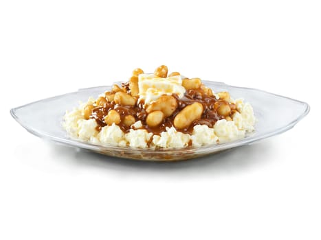 Poutine with fresh cheese curds and rich gravy served on a transparent glass dish Canadian. Food isolated on transparent background.