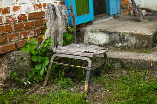 An old chair in an abandoned house. High quality photo