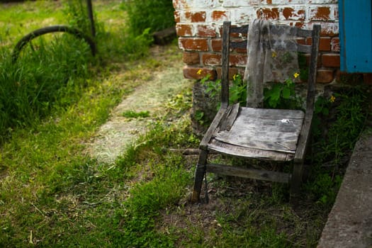 An old chair in an abandoned house. High quality photo