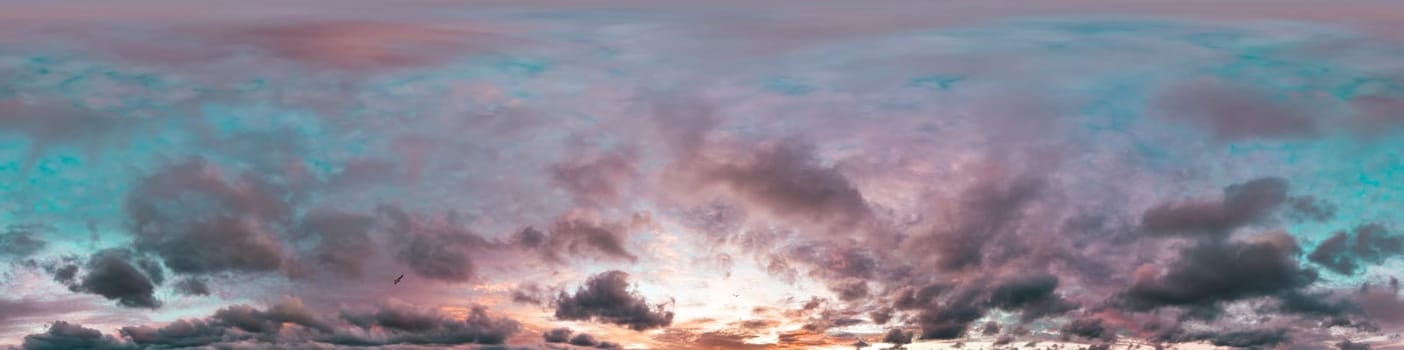 Dramatic Sunset sky 360 panorama. Vibrant sky with bright glowing red pink Cumulus clouds. HDR 360 seamless spherical panorama. Sky dome for aerial drone panoramas. Climate and weather change