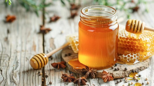 A Mason jar filled with honey, honeycomb, and dippers on a rustic table, creating a cozy presentation