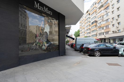 Bucharest, Romania. May 25, 2024. exterior view of the windows of MaxMara luxury brand shop in the city center