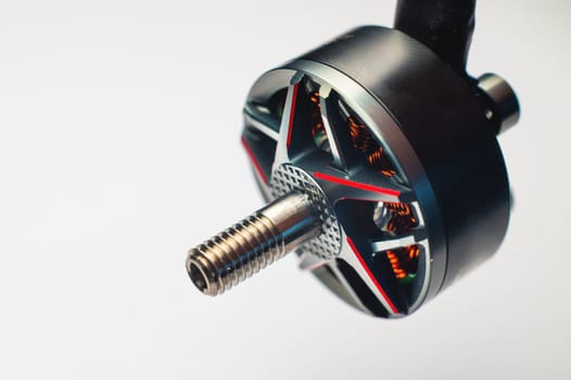 Close-up Small brushless electric motor for drone. Extreme macro photography..