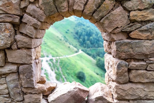 Dagestan Gamsutl. Ancient ghost town of Gamsutl old stone houses in abandoned Gamsutl mountain village in Dagestan, Abandoned etnic aul, summer landscape