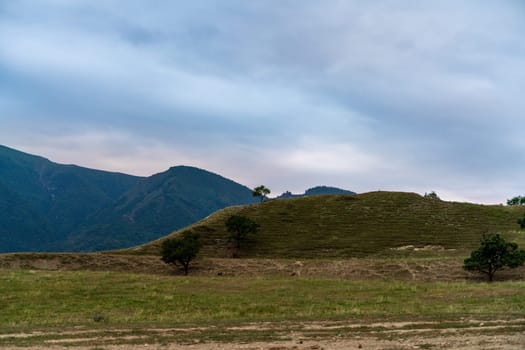 Caucasian mountain. Dagestan. Trees, rocks, mountains, view of the green mountains. Beautiful summer landscape