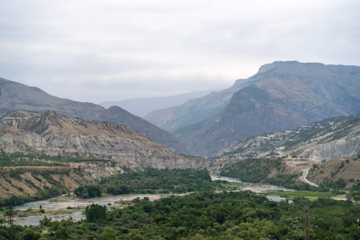 Caucasian mountain. Dagestan. Trees, rocks, mountains, view of the green mountains. Beautiful summer landscape