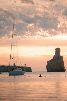 Sunset on Benirras beach in Ibiza in summer.