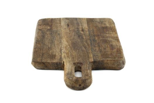Wooden cutting board with a handle, made from old, thick wood, and bears a rustic, vintage appearance characterized by cracks, scratches, isolated on a white background