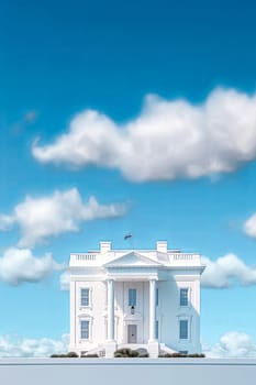 A white house with a flag on the roof. The clouds are white and fluffy