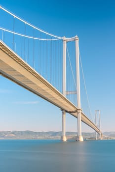 Osmangazi Bridge (Izmit Bay Bridge) located in Izmit, Kocaeli, Turkey. Suspension bridge captured with long exposure technique. Osmangazi Köprüsü