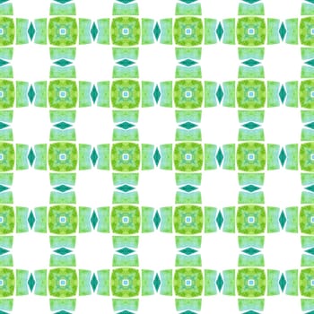 Ikat repeating swimwear design. Green dazzling boho chic summer design. Textile ready gorgeous print, swimwear fabric, wallpaper, wrapping. Watercolor ikat repeating tile border.