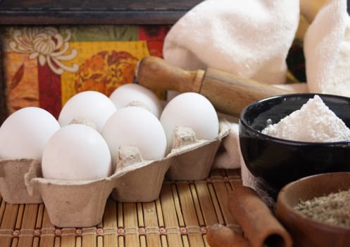 Preparing biscuits in a rustic kitchen. Ingredients and seasonings for handmade cookies.