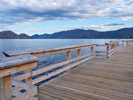 New wooden board walkway along the waterfront on Okanagan lake in British Columbia.