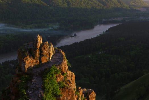 Beauty dawn on the peak, in the mountains in Altay