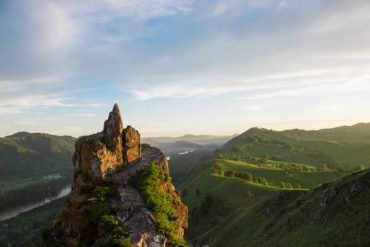 Beauty dawn on the peak, in the mountains in Altay