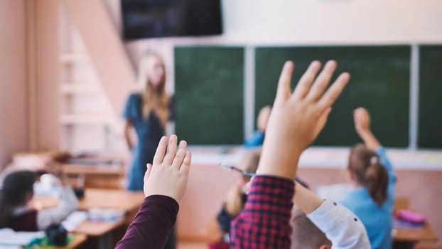 Image of pupils stretching their hands during the lesson