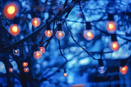 A clear blue sky with a cluster of hanging lights, creating a whimsical and enchanting atmosphere against the serene backdrop.