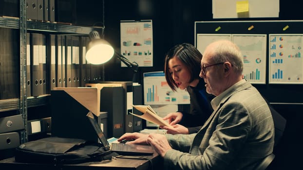 Investigators studying historical maps of crime scenes using federal classified records, officers reconstruct timelines using archived folders. Detectives conducting private investigation. Camera A.