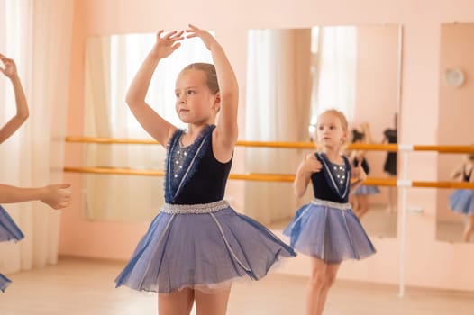 Little ballerinas perform at a dance school