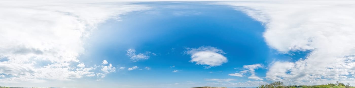 Seamless panorama of sky with light clouds in spherical equirectangular format with complete zenith for use in 3D graphics, game and for composites in aerial drone 360 degree panoramas as a sky dome