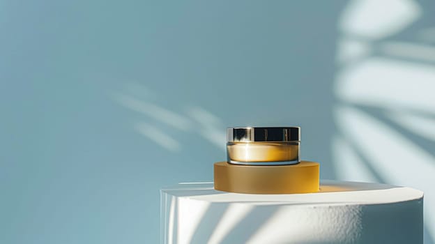 Cosmetic cream in a glass jar on a blue backdrop. Skin care concept. Background for beauty products