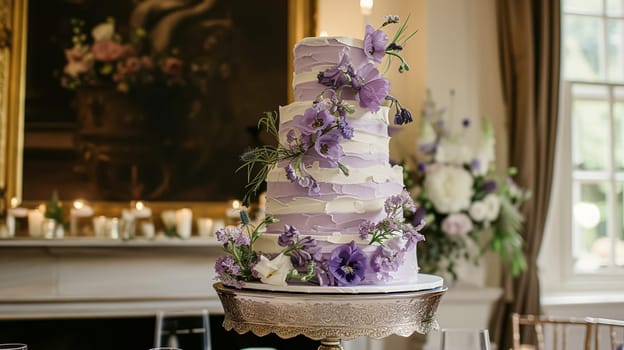 Wedding cake with lavender flowers. Festive table decoration.