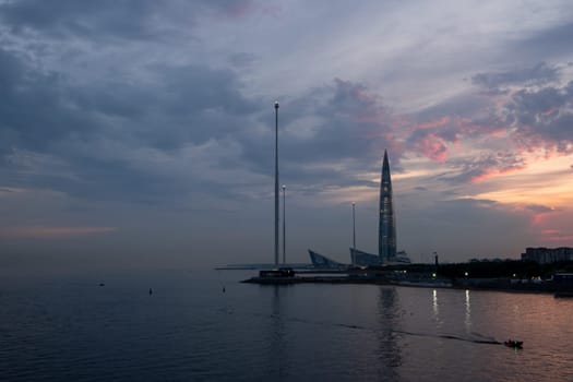 St. Petersburg, Russia, 05.25.2024. - View of the Lakhta Center skyscraper at sunset. Selective focus.