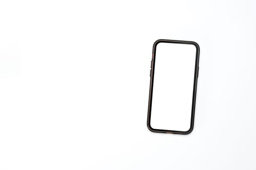 Smartphone with blank screen on isolated white background.