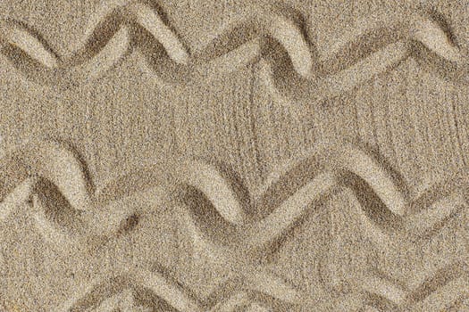 Texture of sandy beach as background, top view