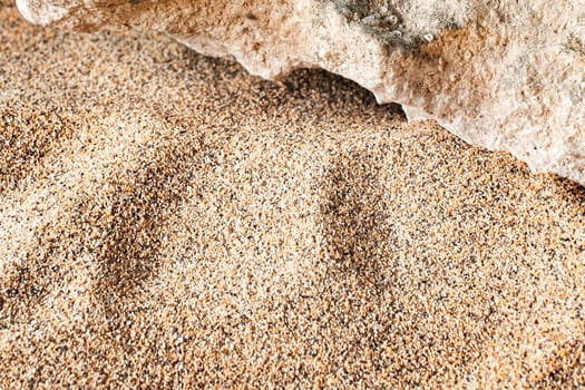 Texture of sandy beach as background, top view