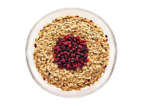 Winter breakfast oatmeal with dried cranberries and maple syrup served in a transparent glass bowl. Food isolated on transparent background.