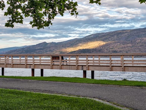 New wooden board walkway along the waterfront on Okanagan lake in British Columbia.