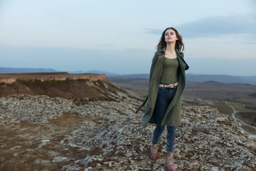 majestic moonlit view woman contemplating from mountain peak under full moon